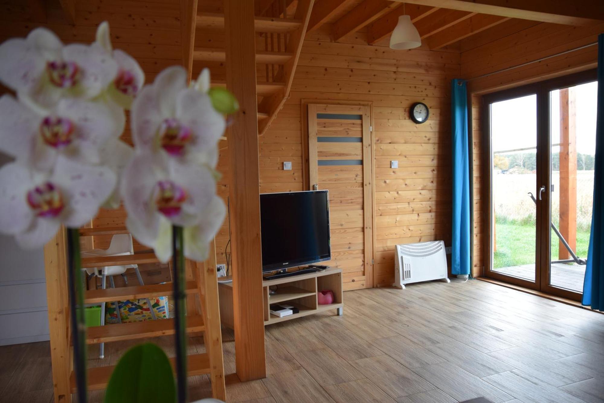 Slowinskie Widoki Domki Flora, Fauna, Noclegi 斯莫尔德兹斯基拉斯 外观 照片